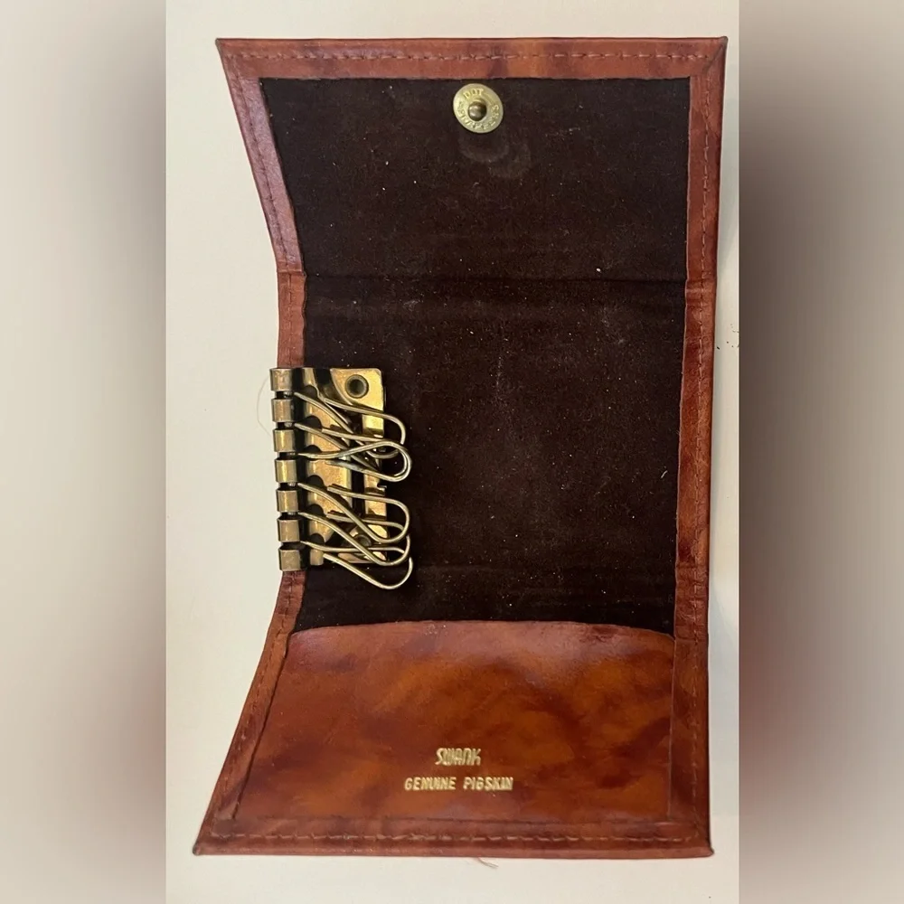Vintage Rolf’s genuine pigskin billfold in original box